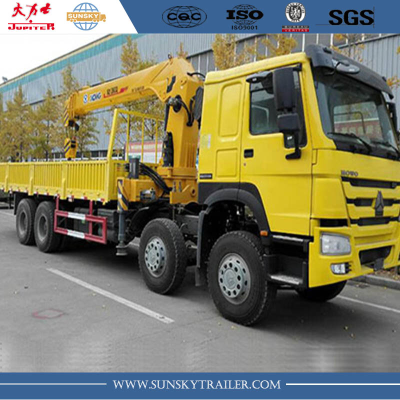 SINOTRUK HOWO 8X4 CARGO TRUCK WITH MOUNTED CRANE for sale